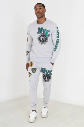 CHEST AND ARM PRINT WITH APPLIQUE DETAIL SWEATSHIRT