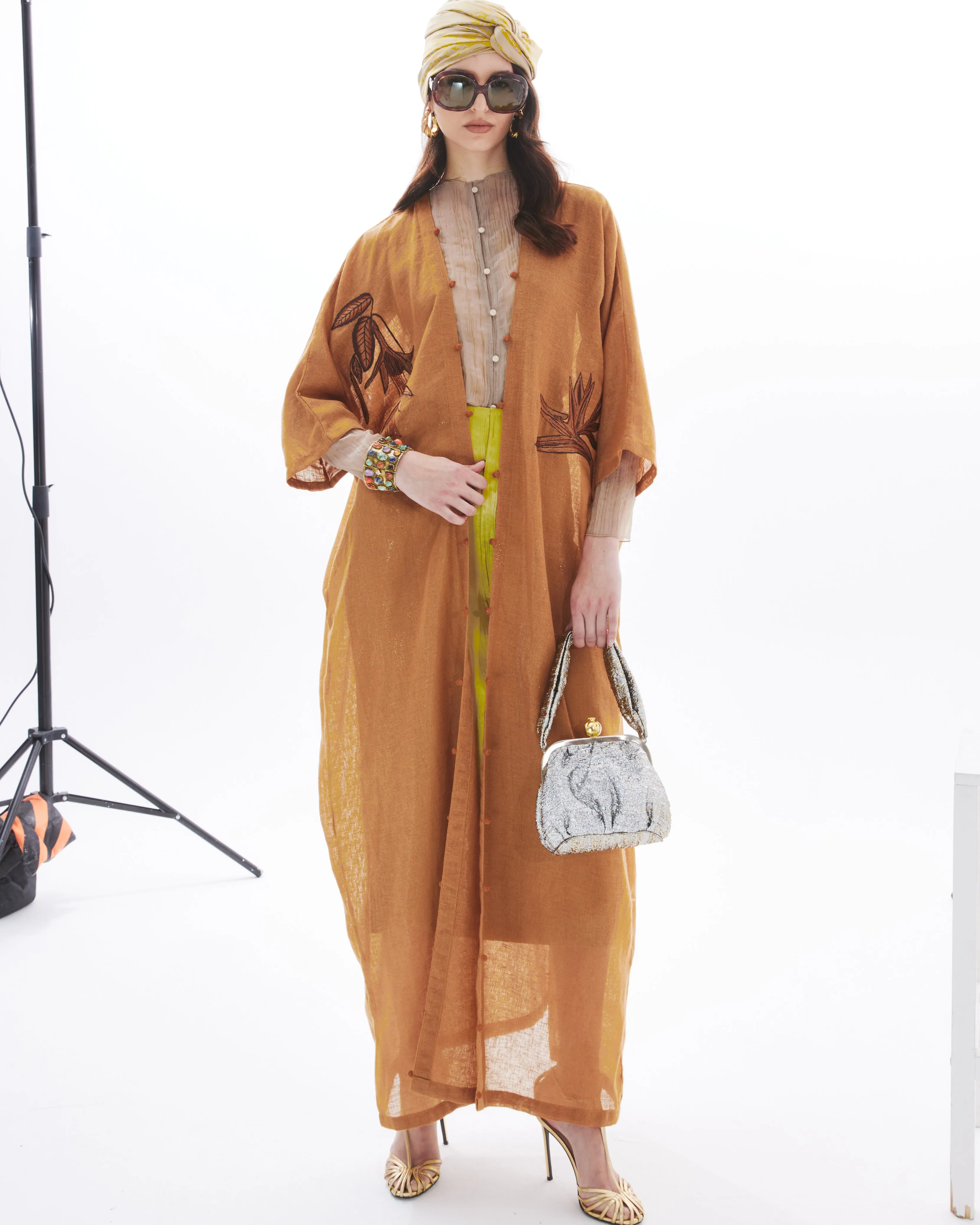 MONOCHROME BIRD OF PARADISE ON RUST ABAYA